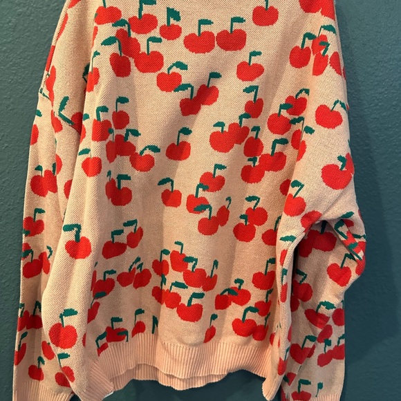 Cream and Red Cherry Sweater with Playful Design - Picture 4 of 6
